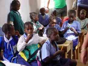 children at their desks in Abuko school