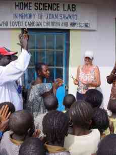 Pippa Howard cuts the ribbon to open the Joan Saward Home Science Lab