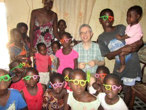 Chris and the kids wearing their pipe-cleaner glasses