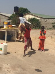 Playing frisbee with the Touray girls