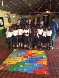 The children and team with their completed square