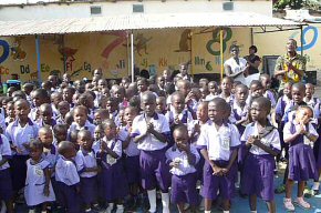 children outside a new classroom