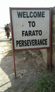 sign for the village of Farato Perseverance