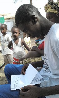 sponsored boy reading his letter