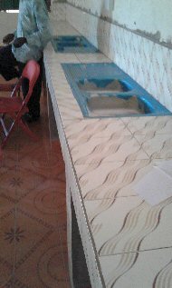 Tiled worktop and sinks in Home Science (blue protective plastic still on!)