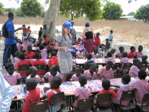 children painting outside