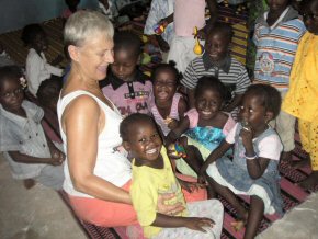 Kira with some of the children