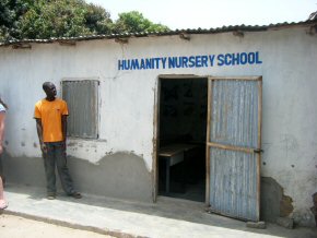 Wandifa outside the single school room