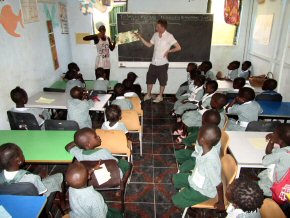 reading a story in Humnity Nursey's new classroom