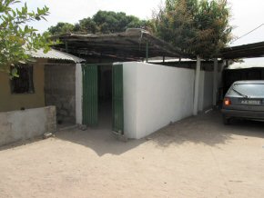 wooden fence now replaced with stronger wall