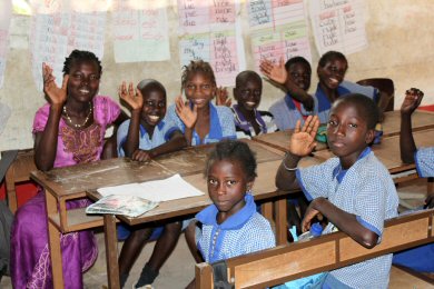 a teacher and some children at the school Jo visited 