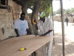 local carpenter cutting plywood