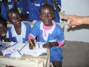 children colouring their poster books (1)