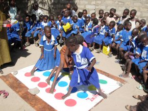 Children playing twister at Hilary Emery Nursery School