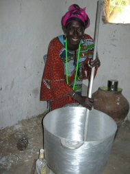 Ebrima's wife with her cooking pot