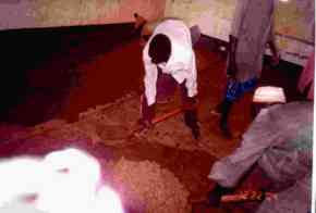 a new concrete floor being laid in one of the classrooms