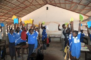 Each child in the school was given an exercise book and pencil