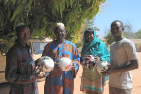 Staff with new footballs