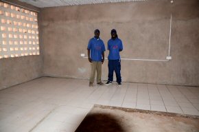 the computer room with floor half tiled