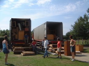 3:30 - the last few items being put into the containers