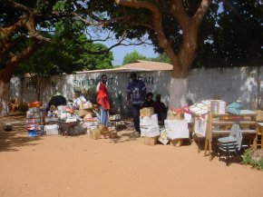 pacakages are stacked in the school compound at Bakau New Town