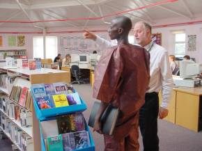 Bakary Gitteh in Weald School library