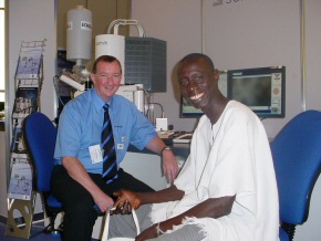 Omar with Ken Robinson, getting ready for a session on a Scanning Electron Microscope