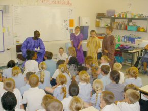 Omar with the children at Stifford Junior School Thurrock