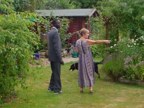 Sandra shows Omar her garden