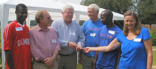 John le Rossignol of Horsham Rotary presents a cheque for 1000