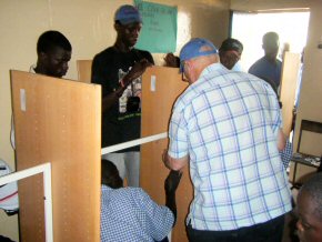 Ian and team assemble the shelving