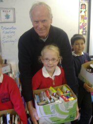 Brian and Ann and some pupils with some of the pencil collection