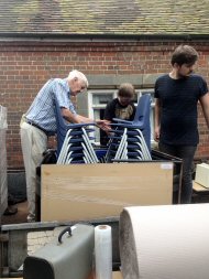 chairs being placed in pallet 2 