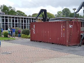 container dropped to ground