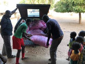 Bags of rice being unloaded