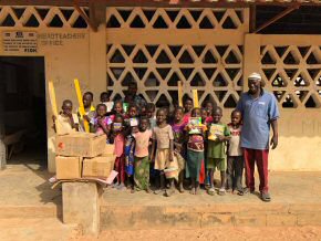 Children with their workbooks and pencils