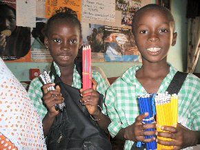 Binta (Abdoulie's twin sister) & Abdoulie with the  first lot of pencils