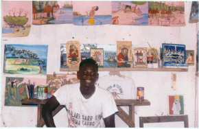 Ousman Sowe in his new studio surrounded by his work.