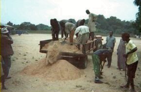 sand is unloaded from a small trailer