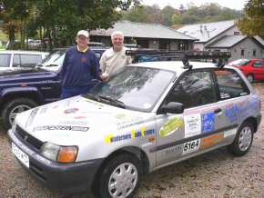 Tim and Nick pose beside their Toyota - now named Bill