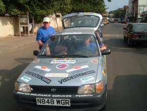 Tim & Nick with 'Bill' in the motorcade