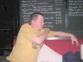 Chris Fisher partly hides the specials board