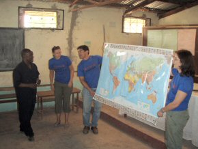 Guillermo and Clare with the world map