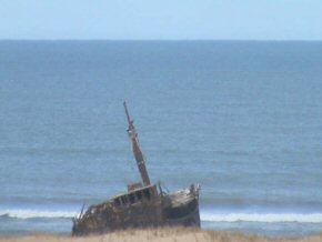 An old shipwreck along desert coast