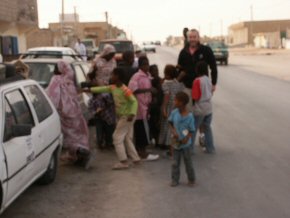 Children wanting sweets at Nouadhibou