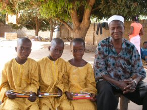 the triplets with their father