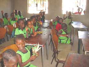 Saloum children using their new furniture