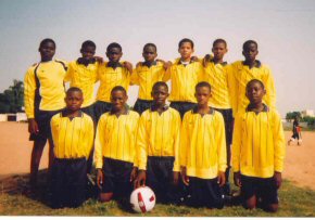 Ndow UBS football team in kit supplied by Christ's Hospital