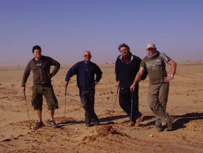 Game of golf in possibly the world's biggest bunker - the Sahara, Mauritania