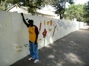 Ahmed Manjang shows off the new wall